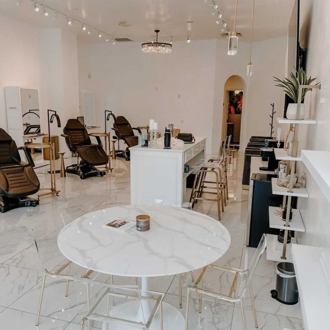 large modern esthetician room in luxury spa with a marble and crystal aesthetic