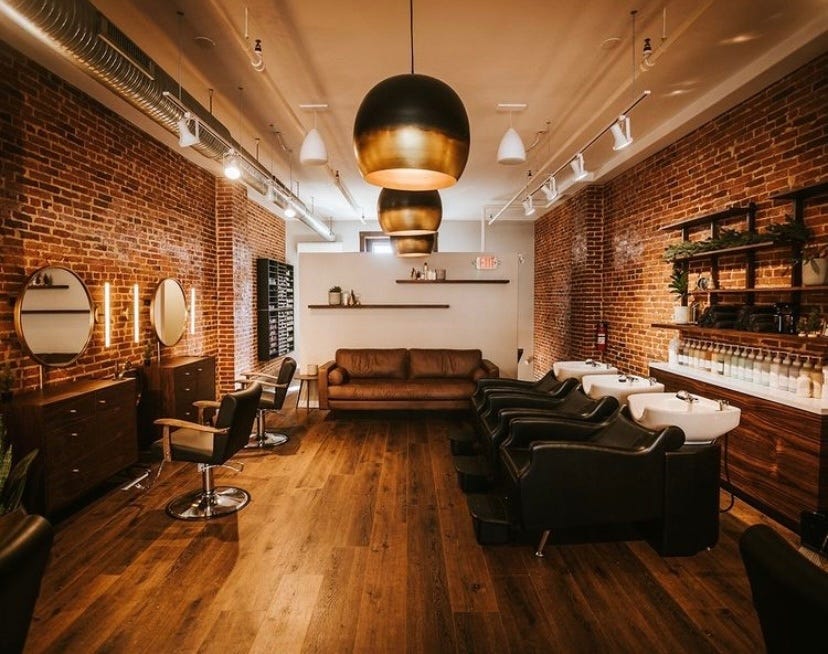 growing hair salon business with shampoo stations and styling chairs