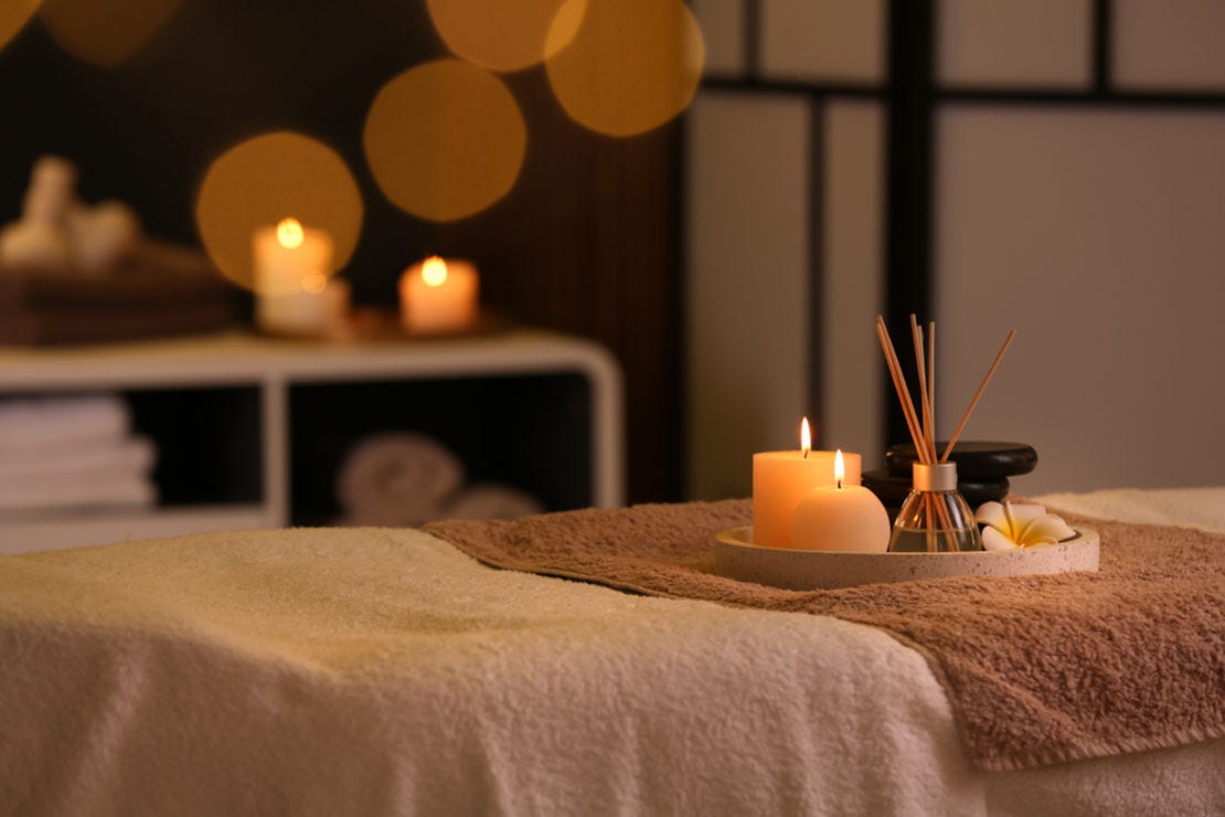 massage bed with candles