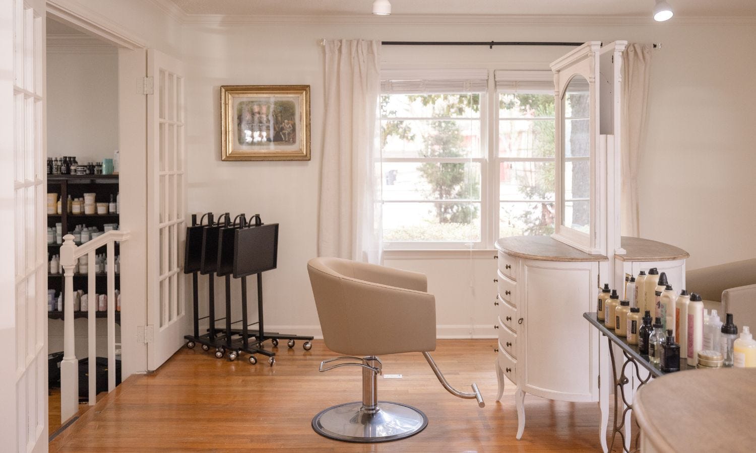 four collapsible salon service trays in a hair salon filled with natural light