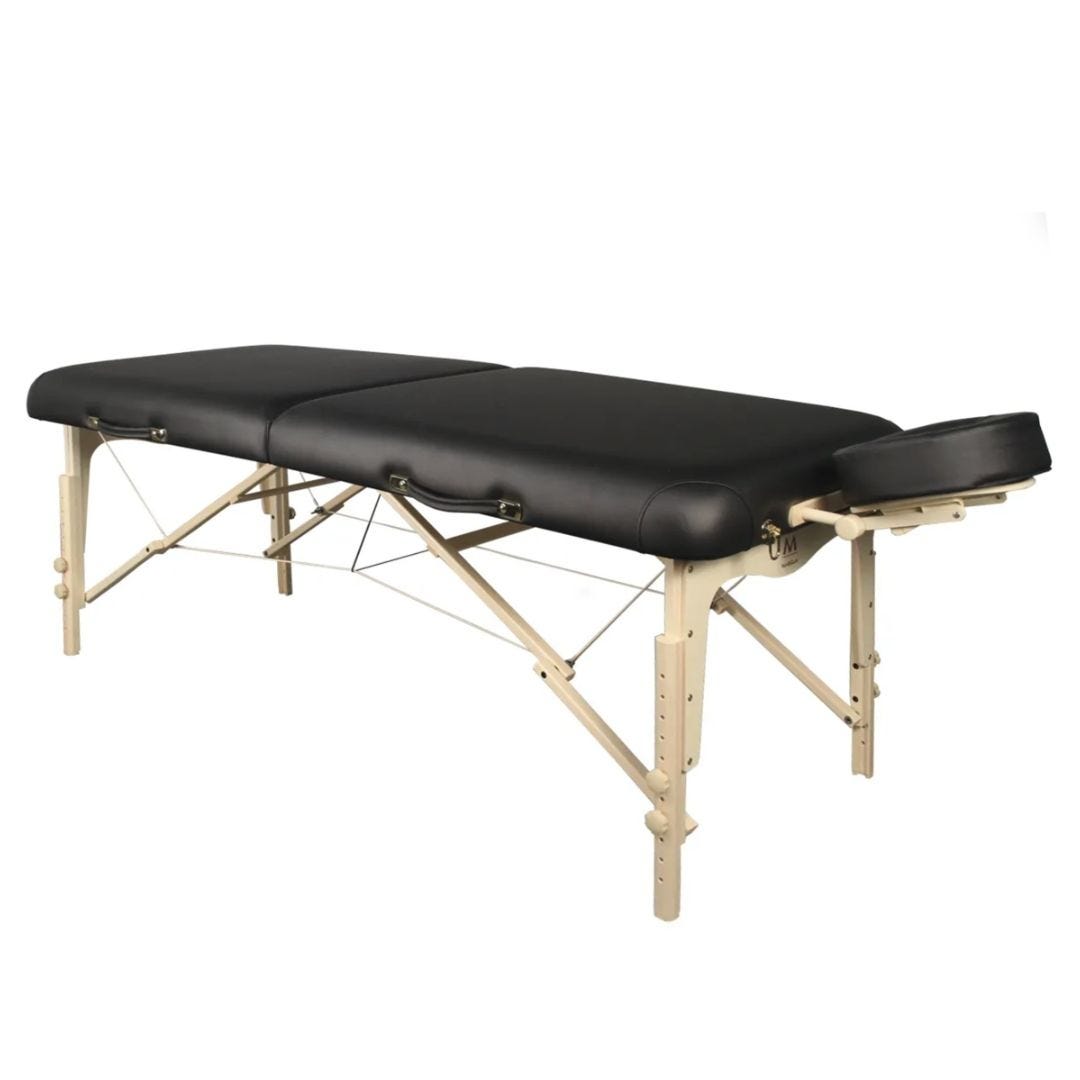 portable massage table with wood frame and black vinyl top