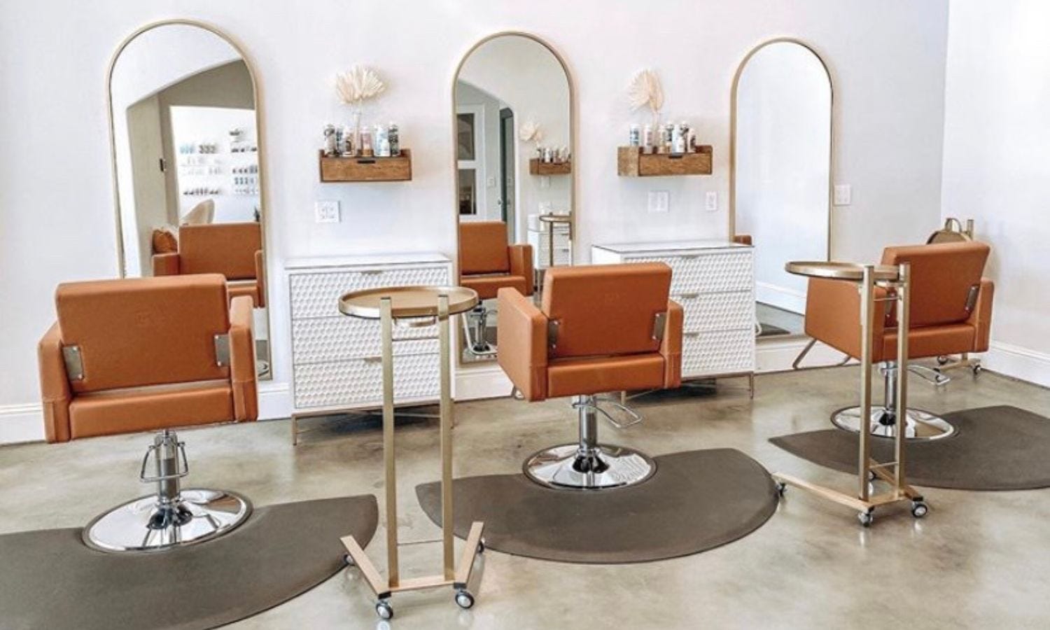 mid century modern salon styling chairs with matching mirrors, styling stations, and trays