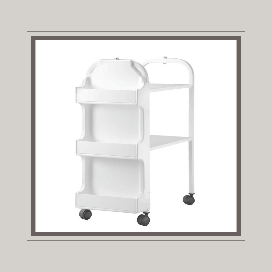 white rolling spa cart with 2 shelves and 3 storage compartments attached to the side