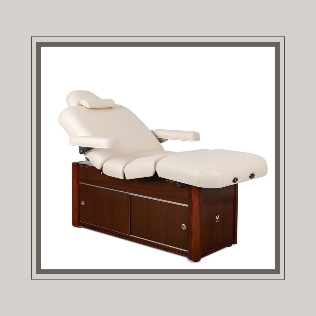 adjustable spa treatment table with built-in cabinet storage in base