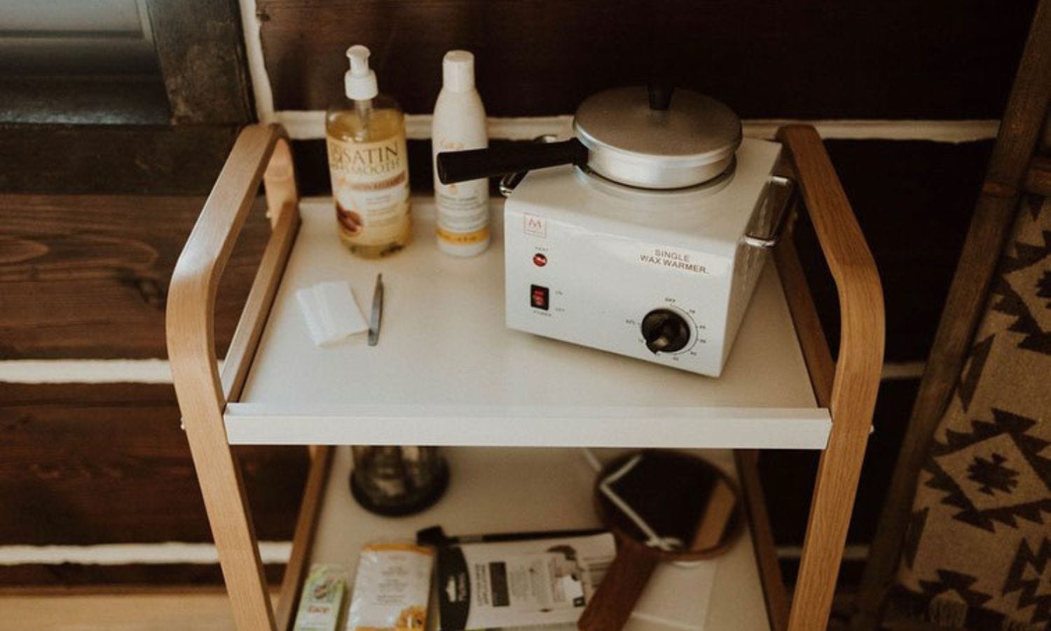 cute and versatile supply cart in a small facial room