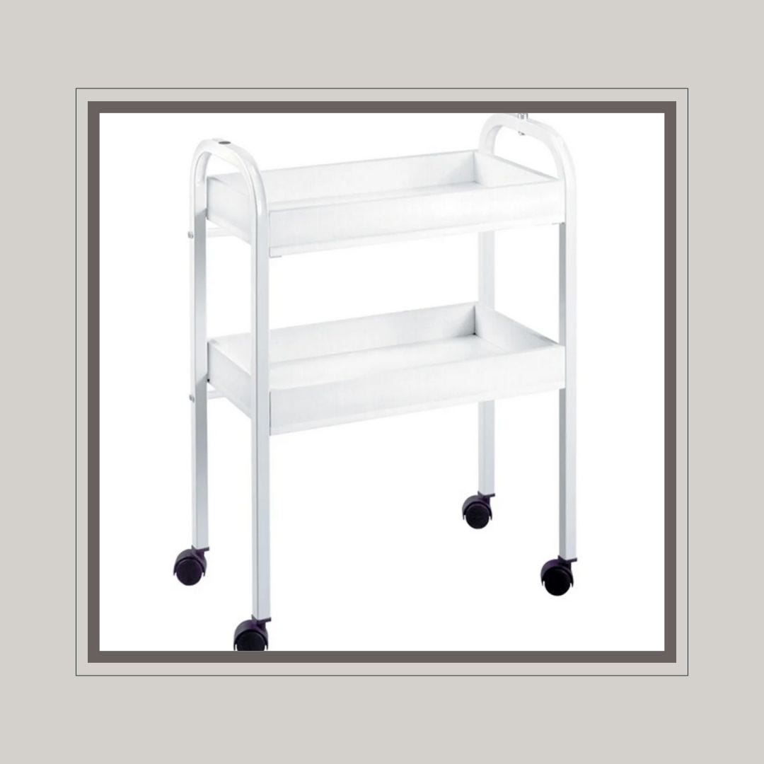 mobile spa shelving unit in white with two shelves, silent casters and a mag lamp holder