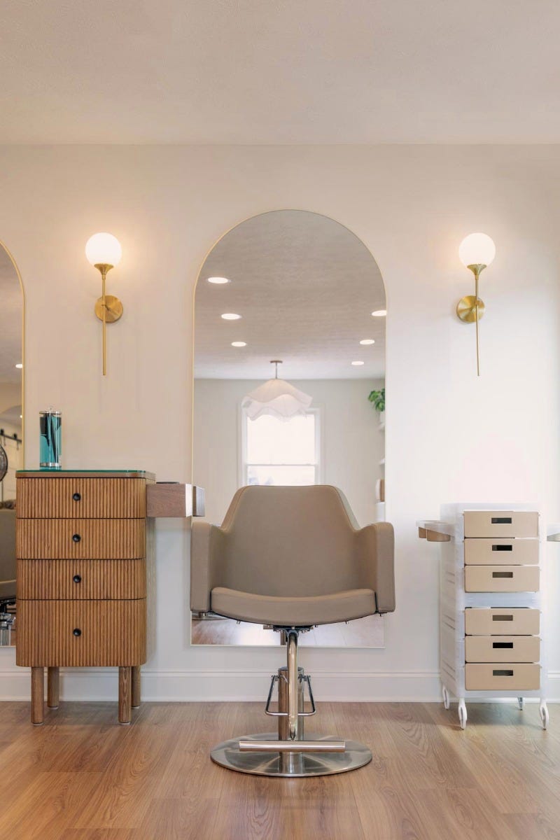 J. Italia hair salon styling station with Knoll styling station, Venturi styling chair and Adelaide arched mirror