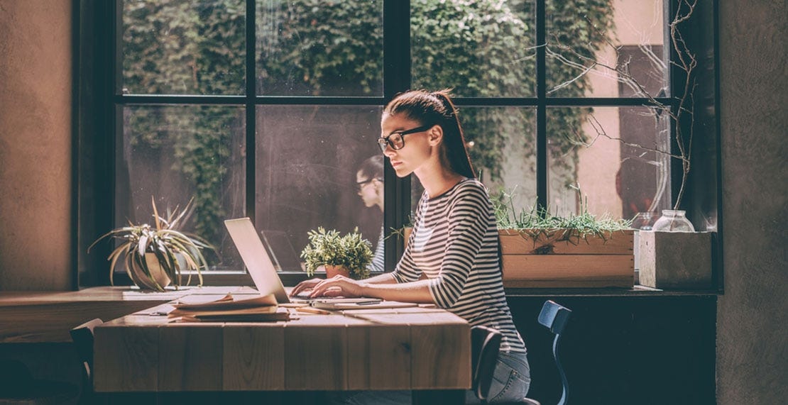 woman working on her laptop