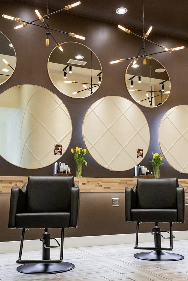 circle mirrors and salon chairs